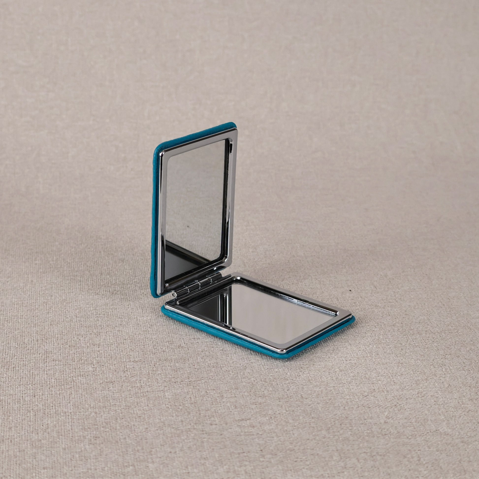 Makeup mirror pocket size light blue