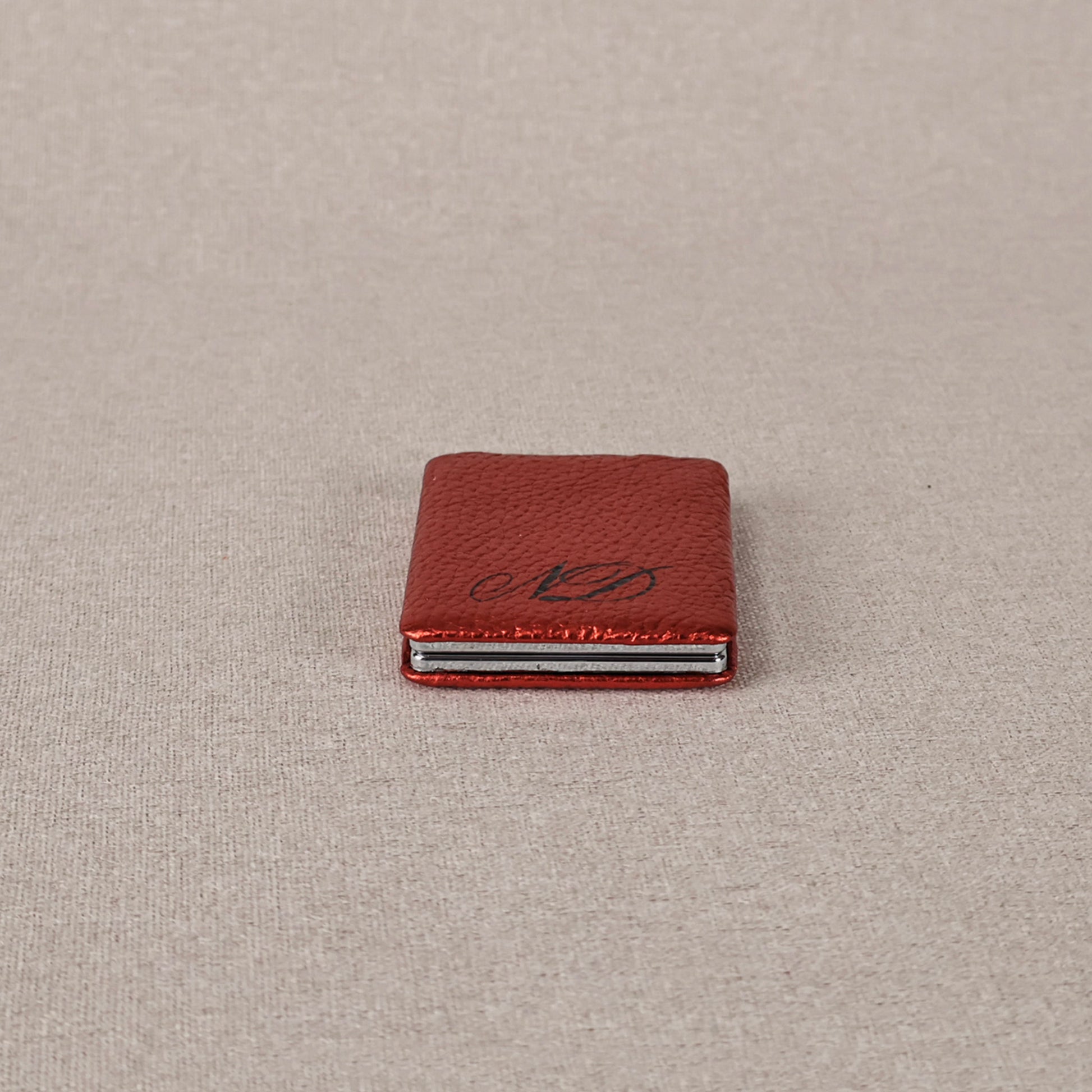 Makeup mirror pocket size metallic red color